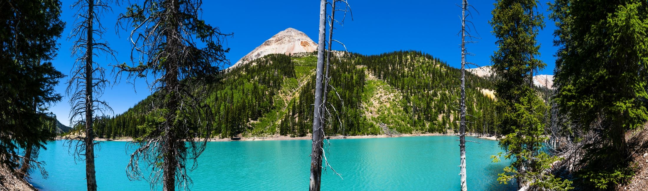 Blue lake near mountain